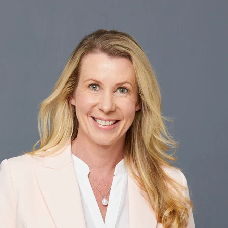 Dr Penelope Gillett, photographed against a plain background.